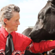 Dr. Temple Grandin with a cow
